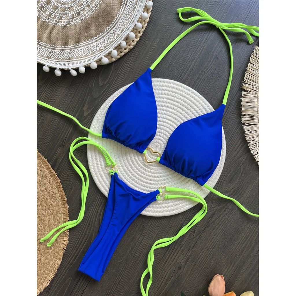 An elegant two-piece swimwear featuring refined splicing details, a halter neckline, and a mini thong high-cut silhouette, designed for a bold yet feminine beach statement