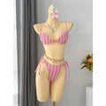An elegant two-piece swimwear featuring a modern striped design, padded top, and flattering high-cut leg, created for a clean, feminine, and confident beach style