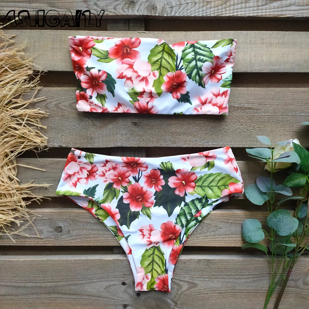 An elegant reversible two-piece swimwear featuring a bandeau top with cross-halter detail and a high-waisted bottom, designed for versatile, feminine summer style