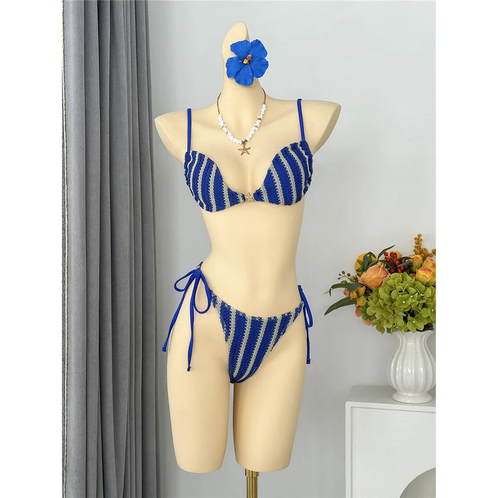 An elegant two-piece swimwear featuring a modern striped design, padded top, and flattering high-cut leg, created for a clean, feminine, and confident beach style