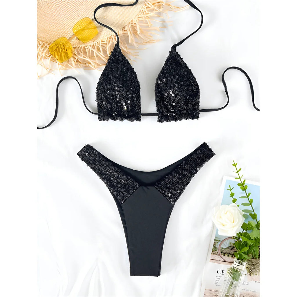 A sophisticated two-piece swimwear featuring a shimmering sequin halter top and high-cut bottoms, designed to enhance feminine elegance with a radiant, confident beach style