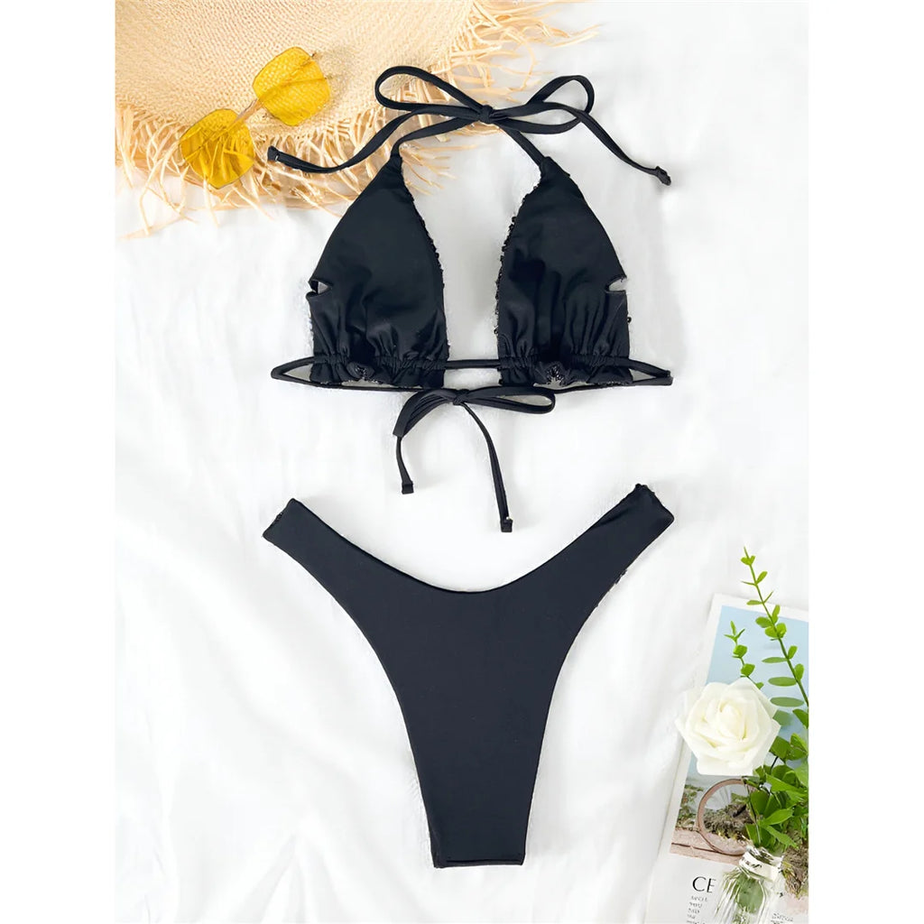 A sophisticated two-piece swimwear featuring a shimmering sequin halter top and high-cut bottoms, designed to enhance feminine elegance with a radiant, confident beach style