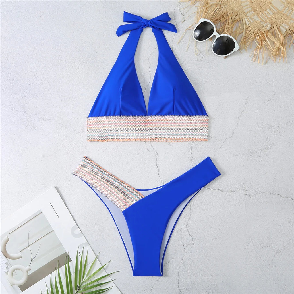 An elegant halter two-piece swimwear featuring refined color-splicing details and a flattering V-neck design, created for a modern, feminine beach style