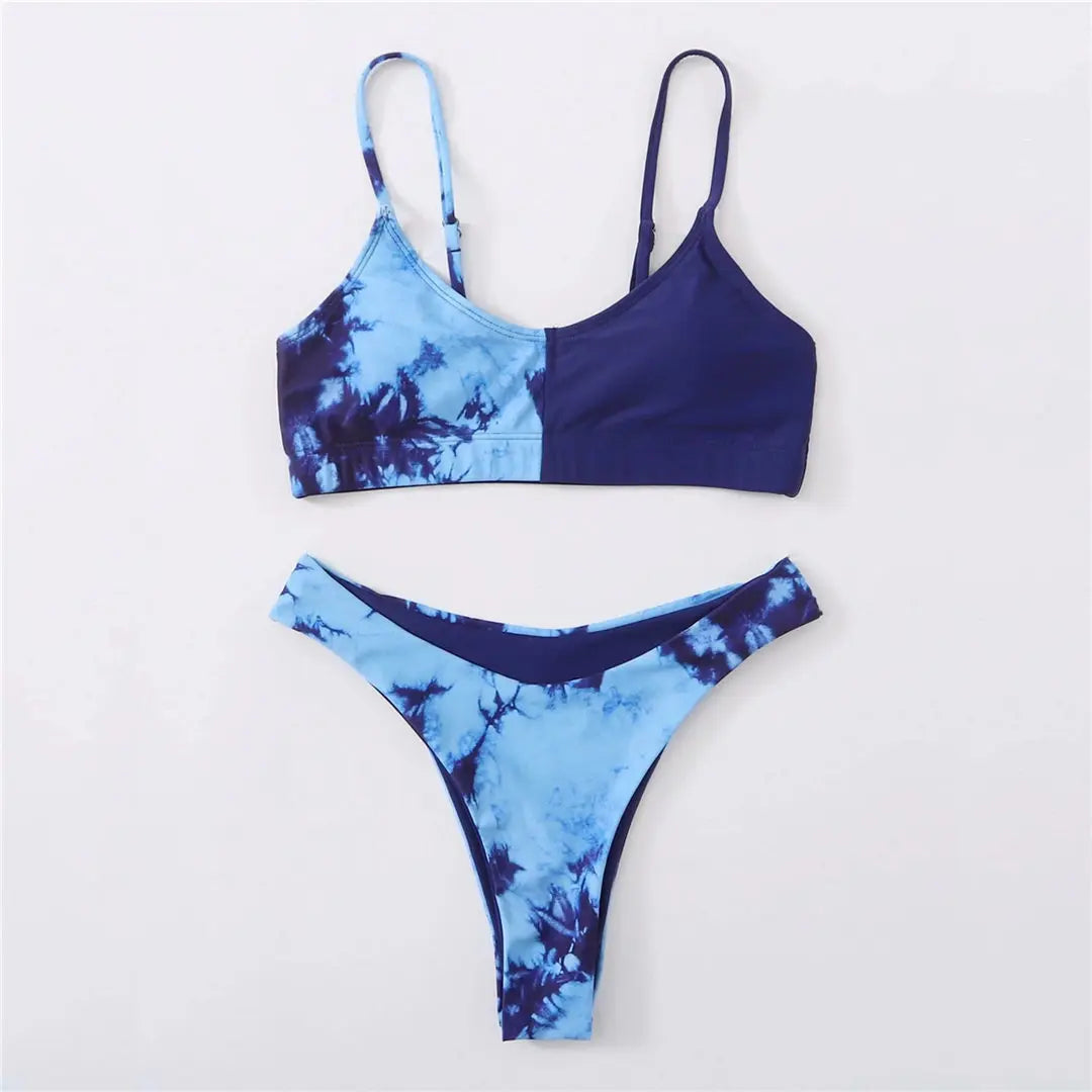 A refined leopard-print two-piece swimwear with a flattering Brazilian cut, designed to enhance feminine elegance and confident beach style
