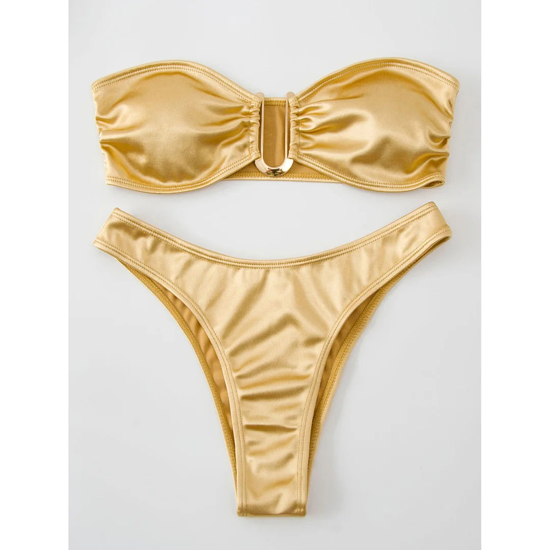 An elegant two-piece swimwear featuring a sleek strapless bandeau top with padded support, designed for a feminine, minimal, and confident beach look