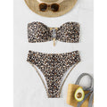 An elegant two-piece swimwear featuring a chic leopard print, bandeau top, and high-leg cut, designed for a feminine and confident beach look